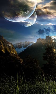 Úchvatná horská krajina s planetami
