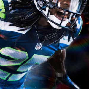 Dynamická akční fotografie hráče NFL