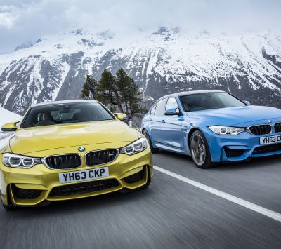 BMW M4 auta ve sněhové krajině